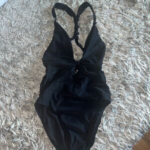 Black one-piece swimsuit.